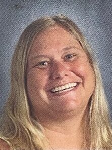 Headshot of a white woman with blond hair. This is Michelle Marshall