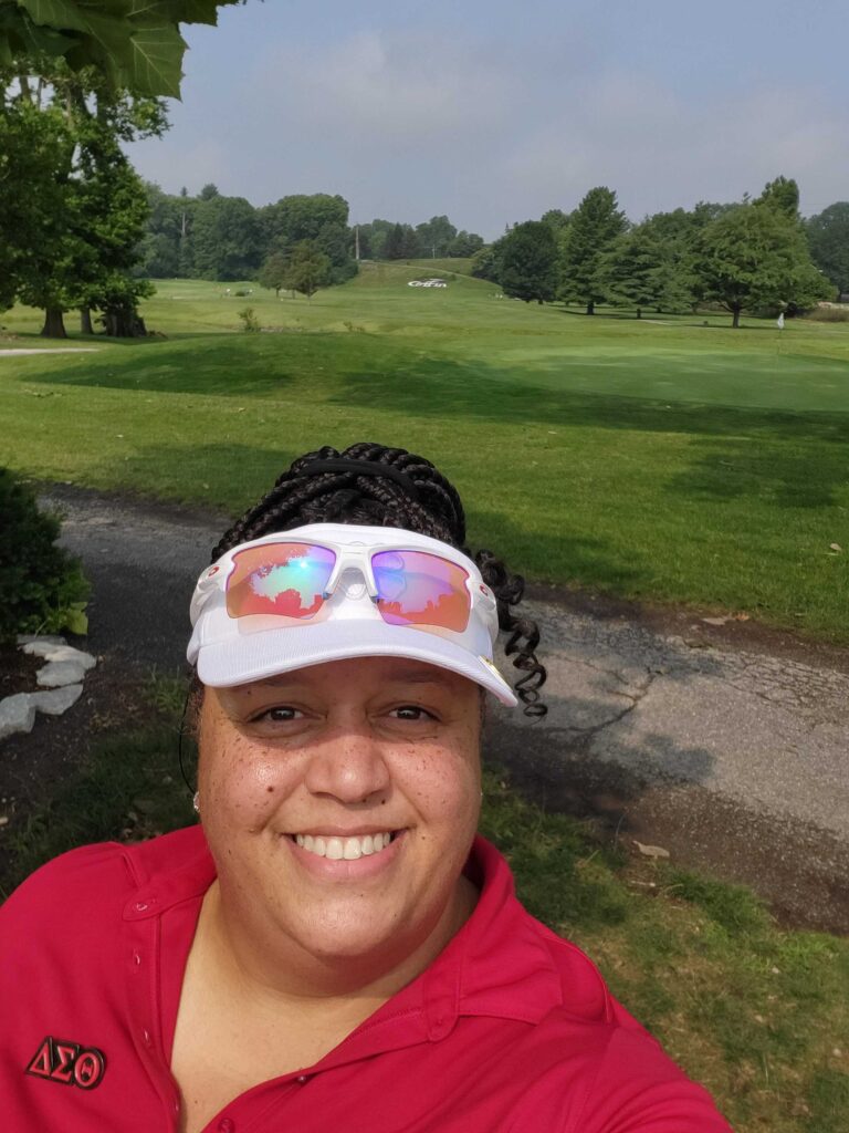 Barbara Patterson Oden, Learning Leader and Manager of Educational Partnerships in the District of Columbia and Virginia, is shown playing golf in her spare time.
