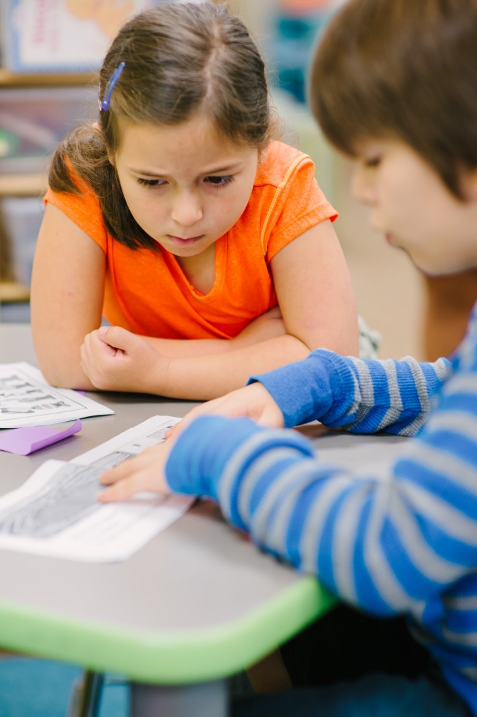 students reading a book