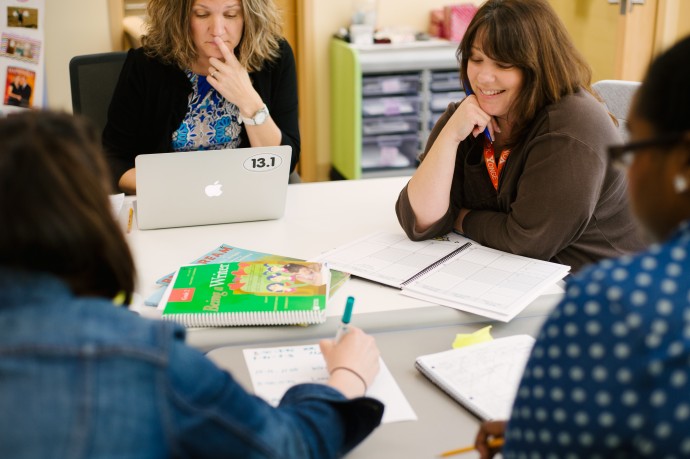 a group of teachers having a discussion