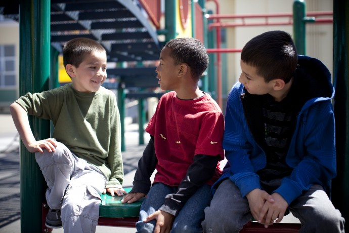 children talking on a playground